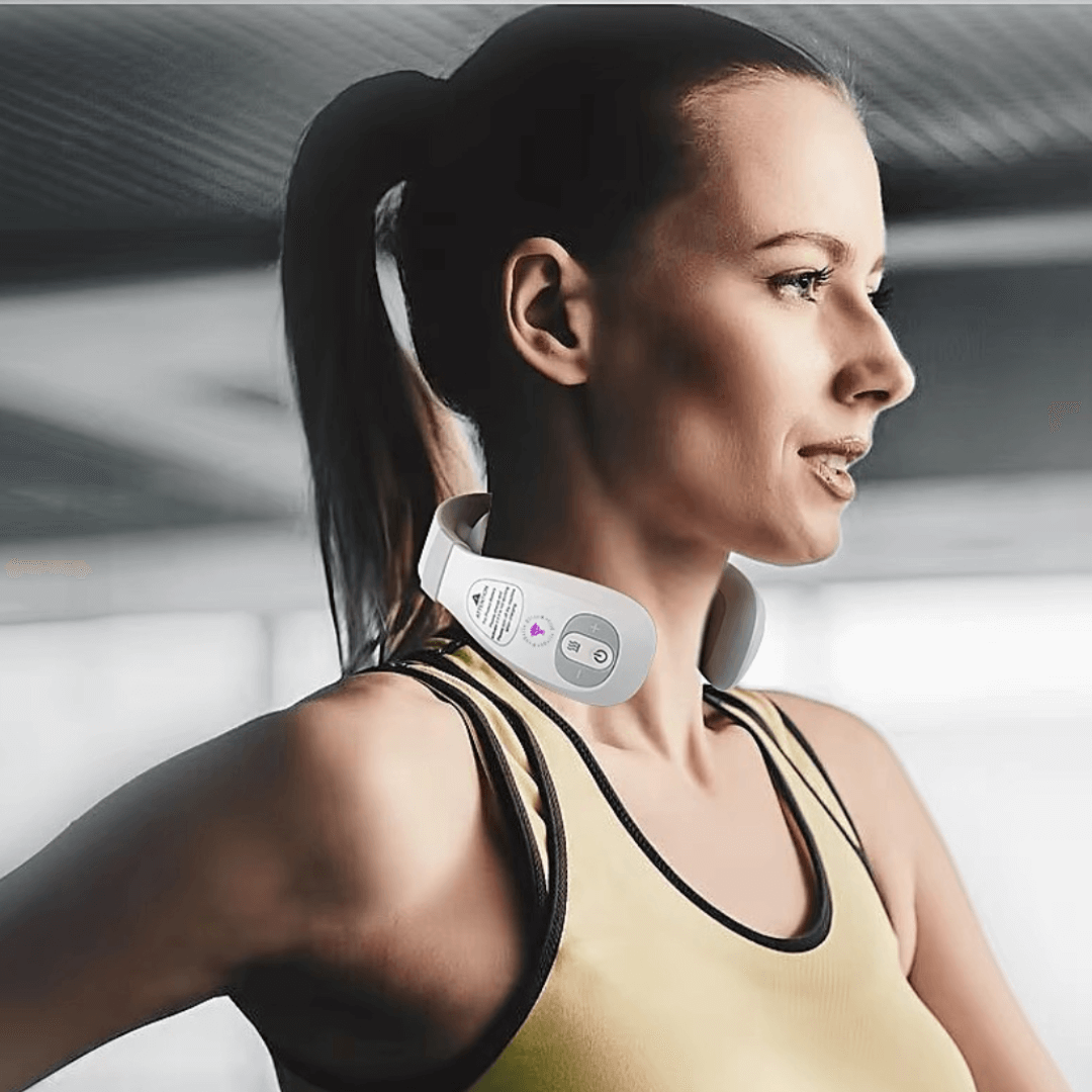 woman using okBelle Bliss neck massager in the gym